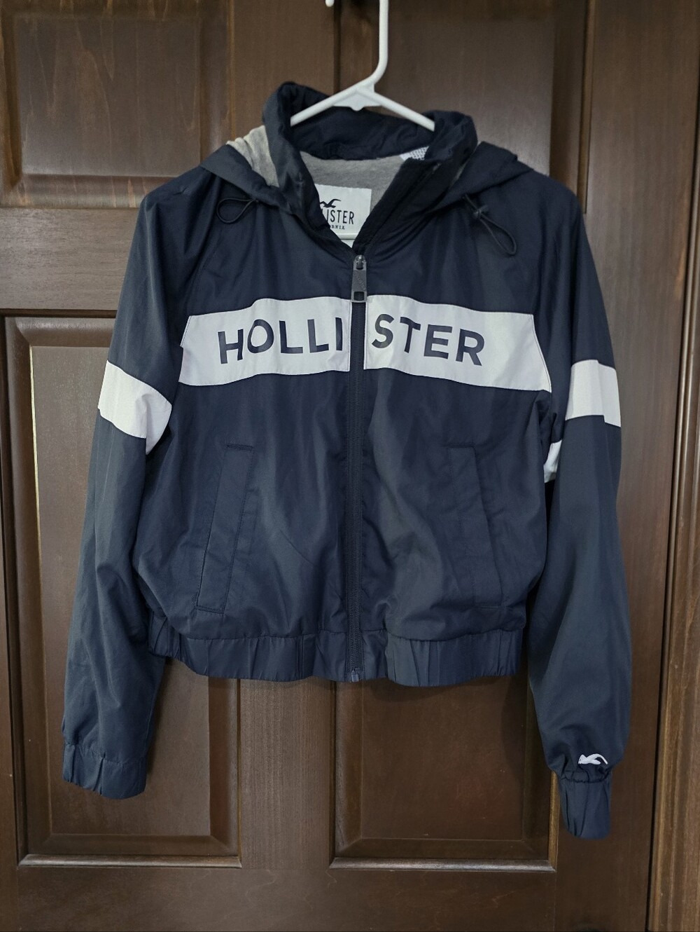 Hollister Navy and White Spellout Windbreaker Jacket Size S
